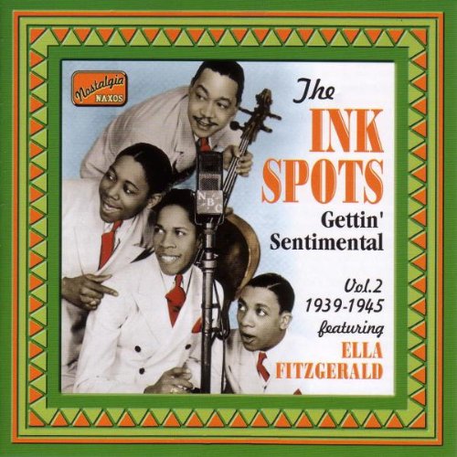 "CD cover with The Ink Spots group photo and green, orange border."