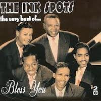 CD cover for The Ink Spots featuring four smiling men in suits.