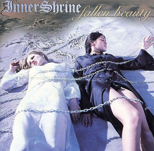 CD cover: two figures reclining with chains on a stone surface.