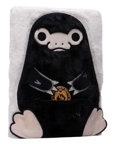 Black, fluffy Niffler plush with white face and paws, holding a coin.