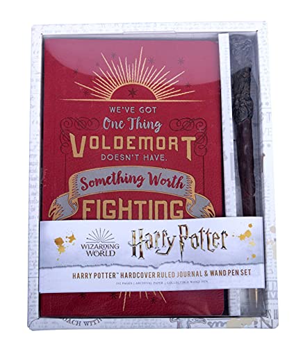 Red Harry Potter journal and wand pen set in clear packaging.