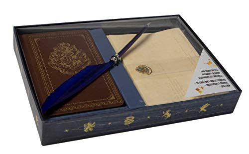 A Harry Potter stationery set featuring a brown journal, blue quill pen, and envelopes.