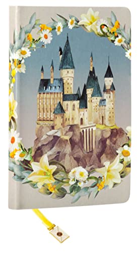 Hogwarts castle illustration on a journal with a yellow ribbon bookmark.