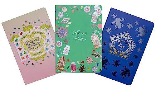 Three Harry Potter themed notebooks with colorful candy and creature designs.