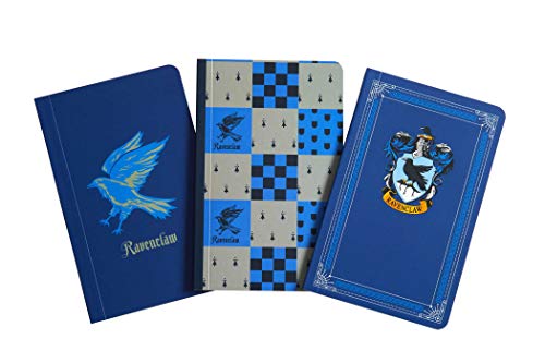 Three blue Ravenclaw-themed pocket notebooks with crest details.