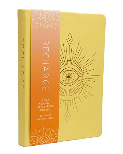 Yellow journal with orange band and sunburst/eye design.