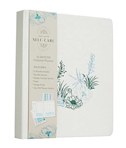 Cream-colored self-care planner with floral details and sticker sheet visible.