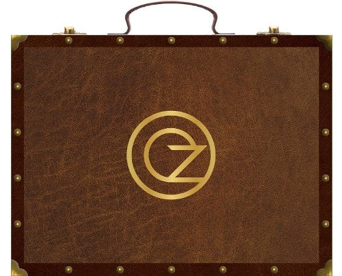 Brown briefcase-style stationery set with a gold circular logo.