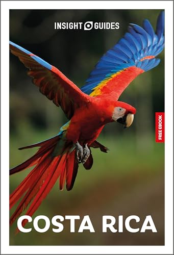 A scarlet macaw in flight on the cover of an Insight Guides Costa Rica book.