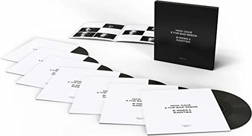 Black vinyl records and white sleeves with black text, Nick Cave & The Bad Seeds.