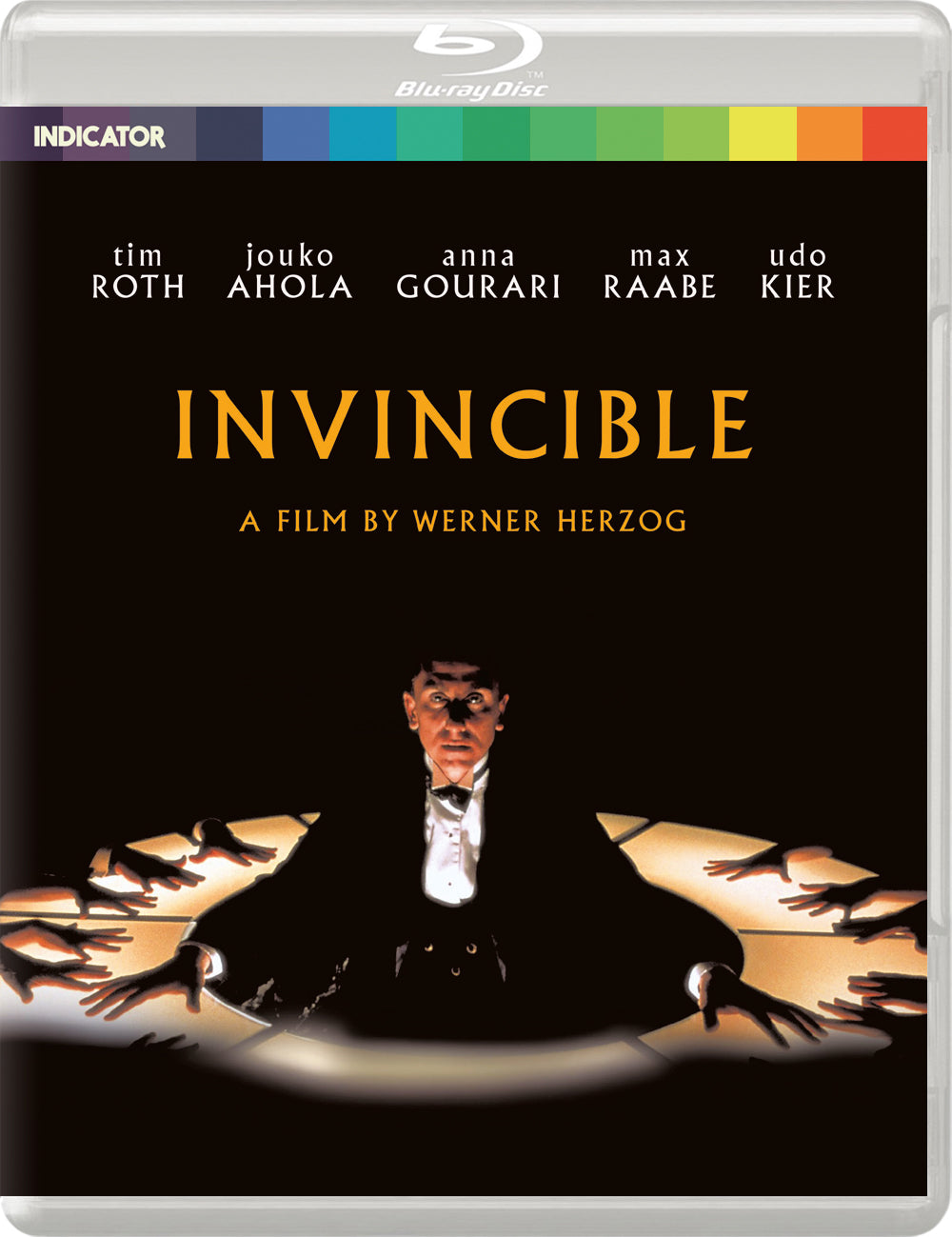 Blu-ray cover for “Invincible” featuring a man in a white suit.