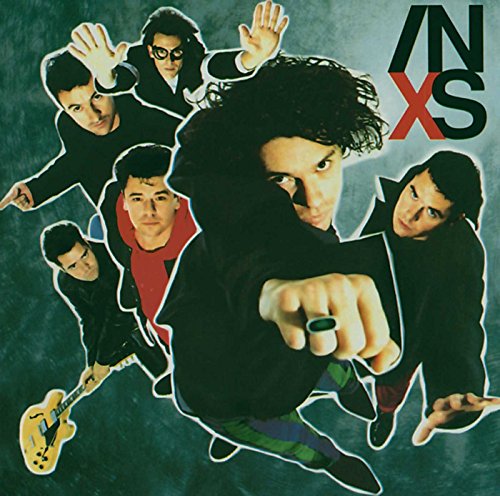INXS band members in dynamic poses on album cover, dark teal background.
