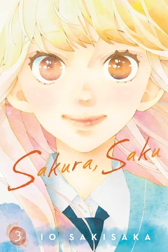 Close-up of a smiling girl with blonde hair on the Sakura, Saku manga cover.