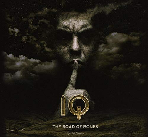 Dark album cover featuring a stone face with a finger to lips, “IQ” logo.