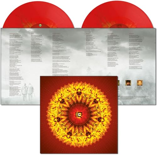 Red vinyl record of Iq’s “The Seventh House” with album artwork displayed.