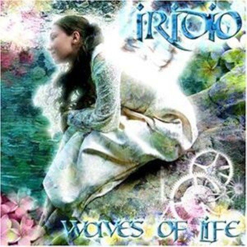 CD cover: woman in white, flowing water, floral background.