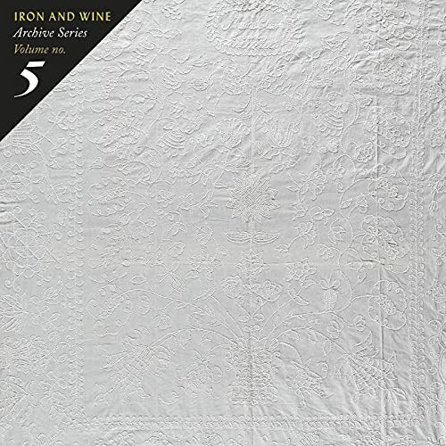 Iron & Wine album cover: textured white fabric with floral design.