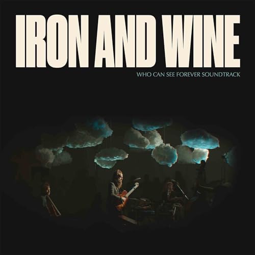 Iron And Wine album cover with musicians silhouetted beneath clouds.