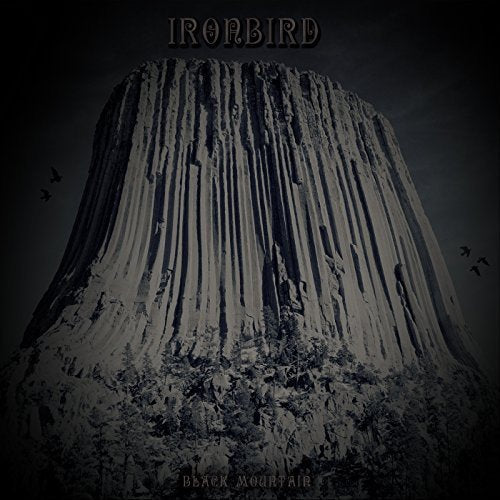 CD cover for Ironbird’s “Black Mountain” featuring a dark, textured mountain.