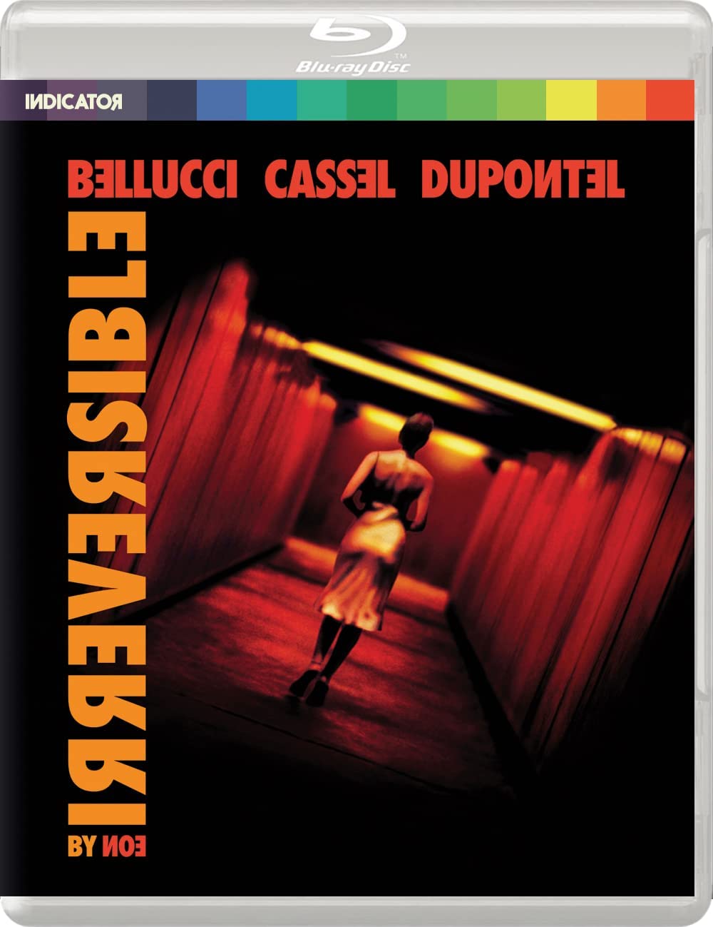 "Blu-ray case with cover art featuring a woman walking down a red-lit corridor."