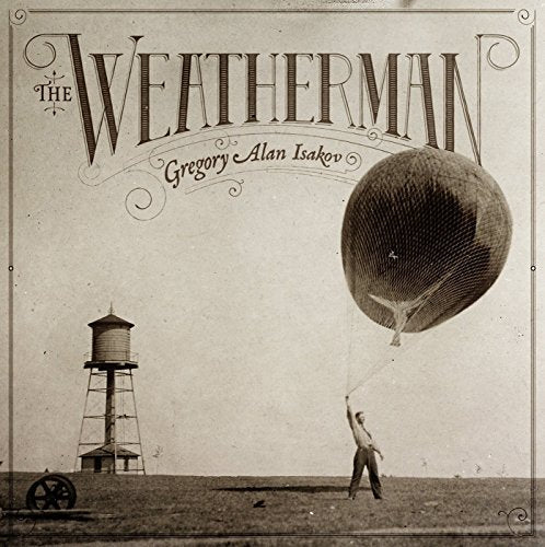 "Album cover featuring a man holding a large balloon near a water tower."