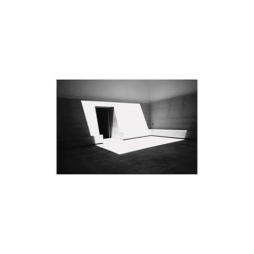 Black and white photo of a stark, modern architectural interior.
