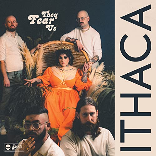 Ithaca album cover: band portrait with woman in orange dress.