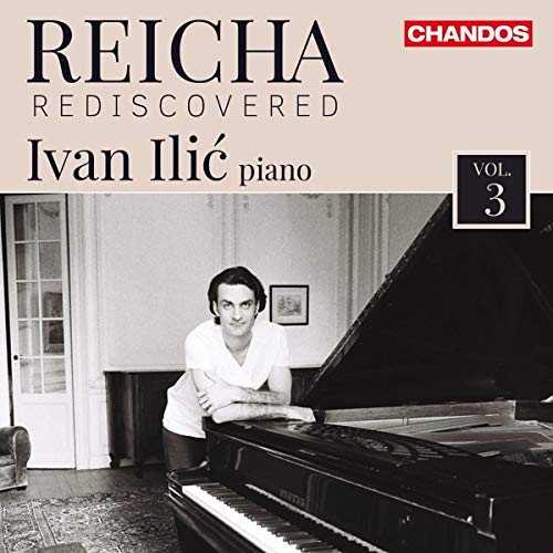 A man leaning on a piano, classical music album cover with text.