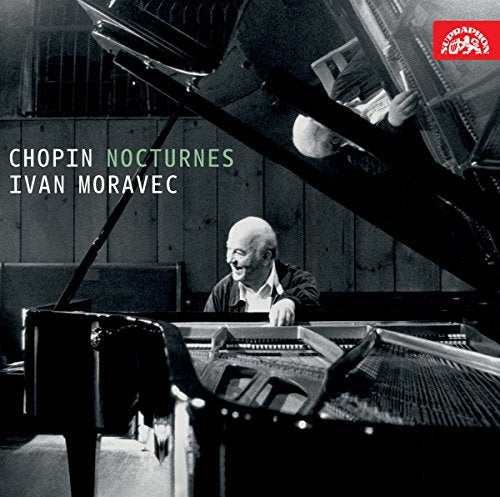 Black and white photo of pianist Ivan Moravec playing a grand piano.