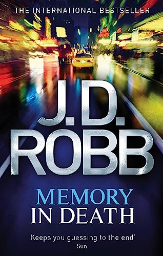 Book cover: "Memory In Death" by J.D. Robb, with city lights background.
