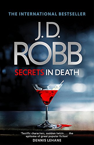 Book cover: "Secrets in Death" by J.D. Robb, with a martini glass.