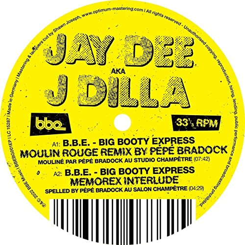Yellow vinyl record label featuring "J Dilla" and tracklist details.