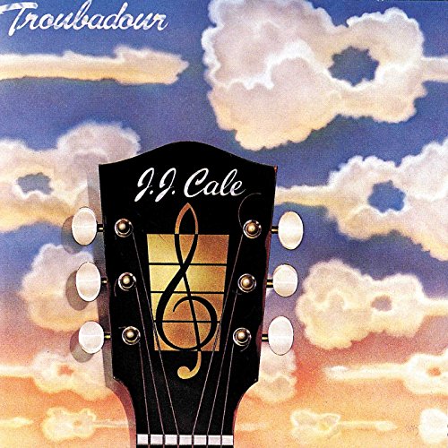 Album cover showing a guitar headstock against a cloudy, sunset-colored sky.