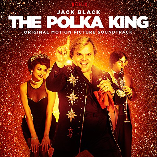 Jack Black and two band members posing against a sparkling gold background.