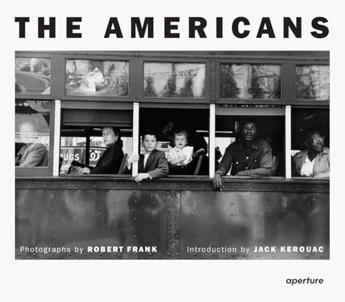 Black and white cover of The Americans showing people looking out of trolley windows.