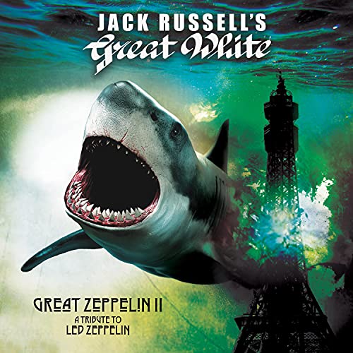 A great white shark swims underwater near the Eiffel Tower on this album cover.