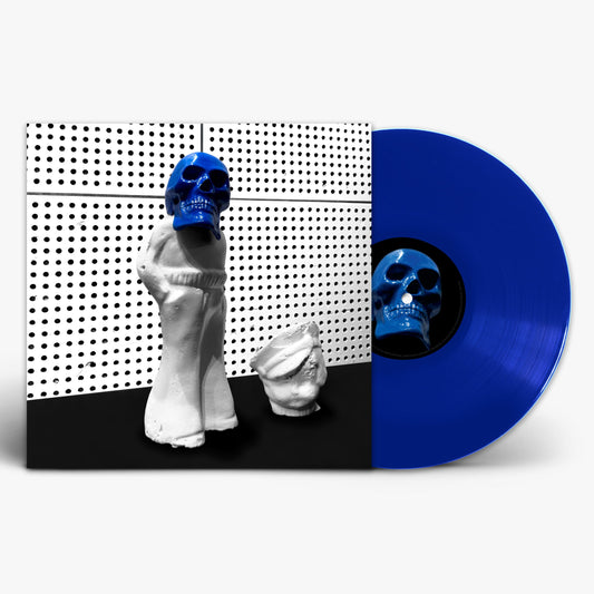 Blue vinyl record next to its cover featuring a white figurine with a skull head.