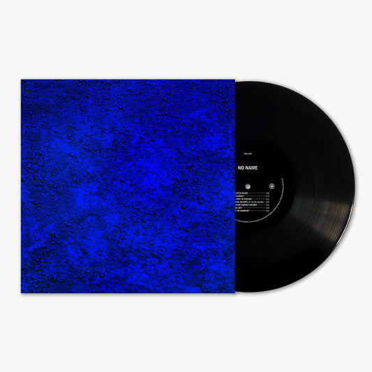 A black vinyl record next to a square sleeve with a textured blue surface.