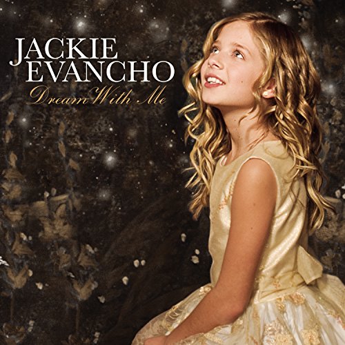 Jackie Evancho album cover, young girl with curly hair, sparkly background.