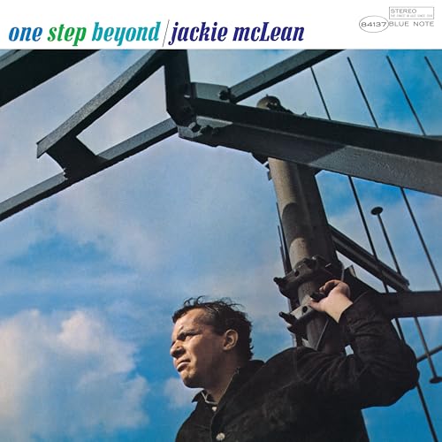 Jackie McLean album cover with a man looking up at metal structures.