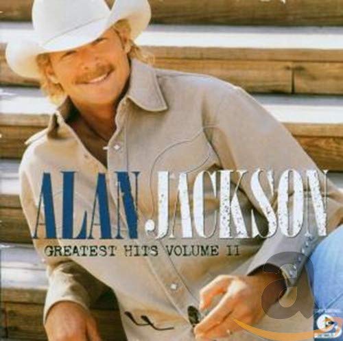 Alan Jackson wearing a cowboy hat and tan shirt on his Greatest Hits album cover.