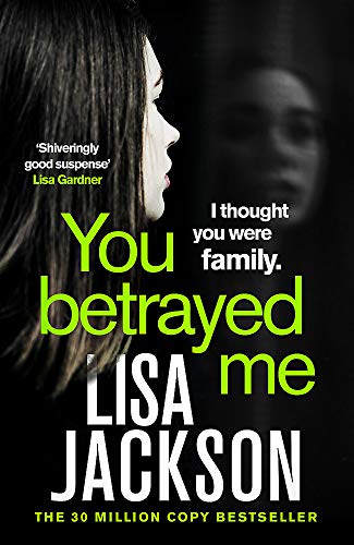Book cover: dark image of two faces with bold title "You Betrayed Me".