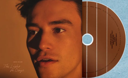 Jacob Collier CD cover featuring a close-up portrait and abstract design.