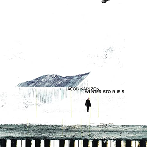Album cover: snowy landscape with a lone figure and text "Winter Stories".