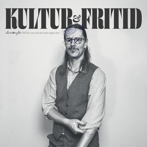 Black and white album cover featuring a man with glasses and beard.