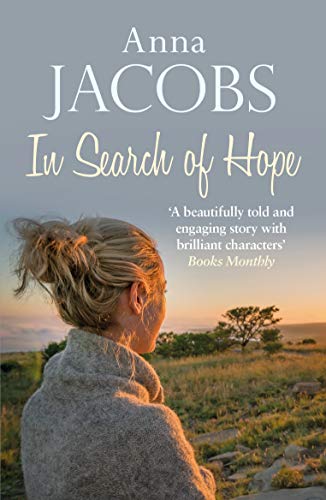 Book cover: woman looking at a coastal landscape at sunset.