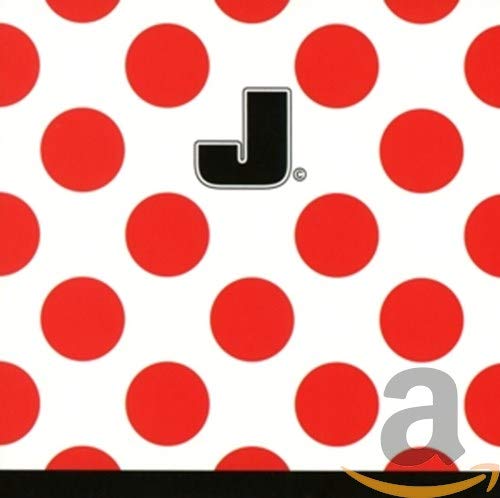 Red polka dots with a large black "J" and partial text.