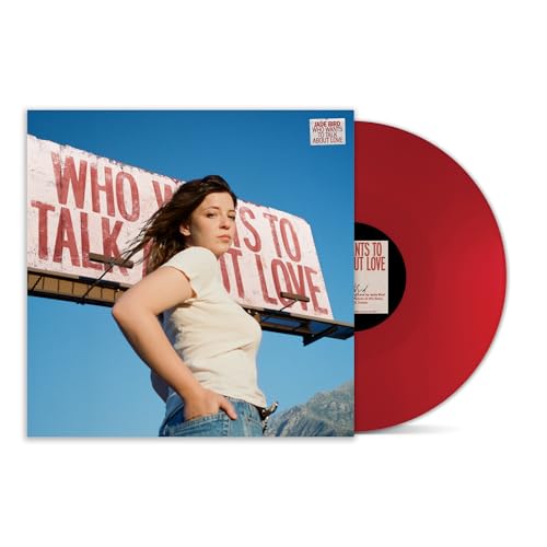 Jade Bird album cover featuring a woman before a billboard and a red vinyl.