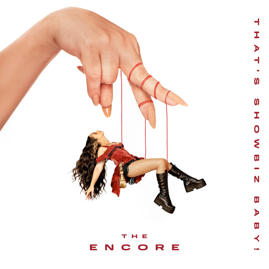 Jade album cover: a woman suspended by strings from a giant hand.