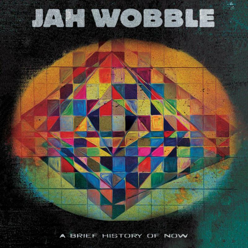 Jah Wobble album cover: colorful, geometric design with artist’s name.